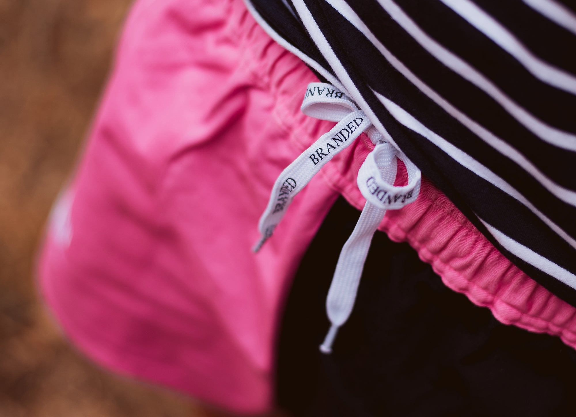 Blush pink / navy Branded clothing shorts